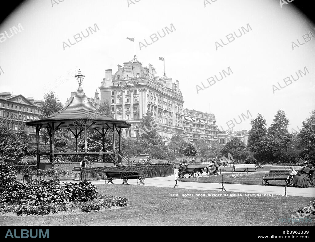 Victoria Embankment Gardens, Westminster, London, c1890s. A view of the Cecil Hotel (built 1886) from the gardens with a bandstand in the foreground.