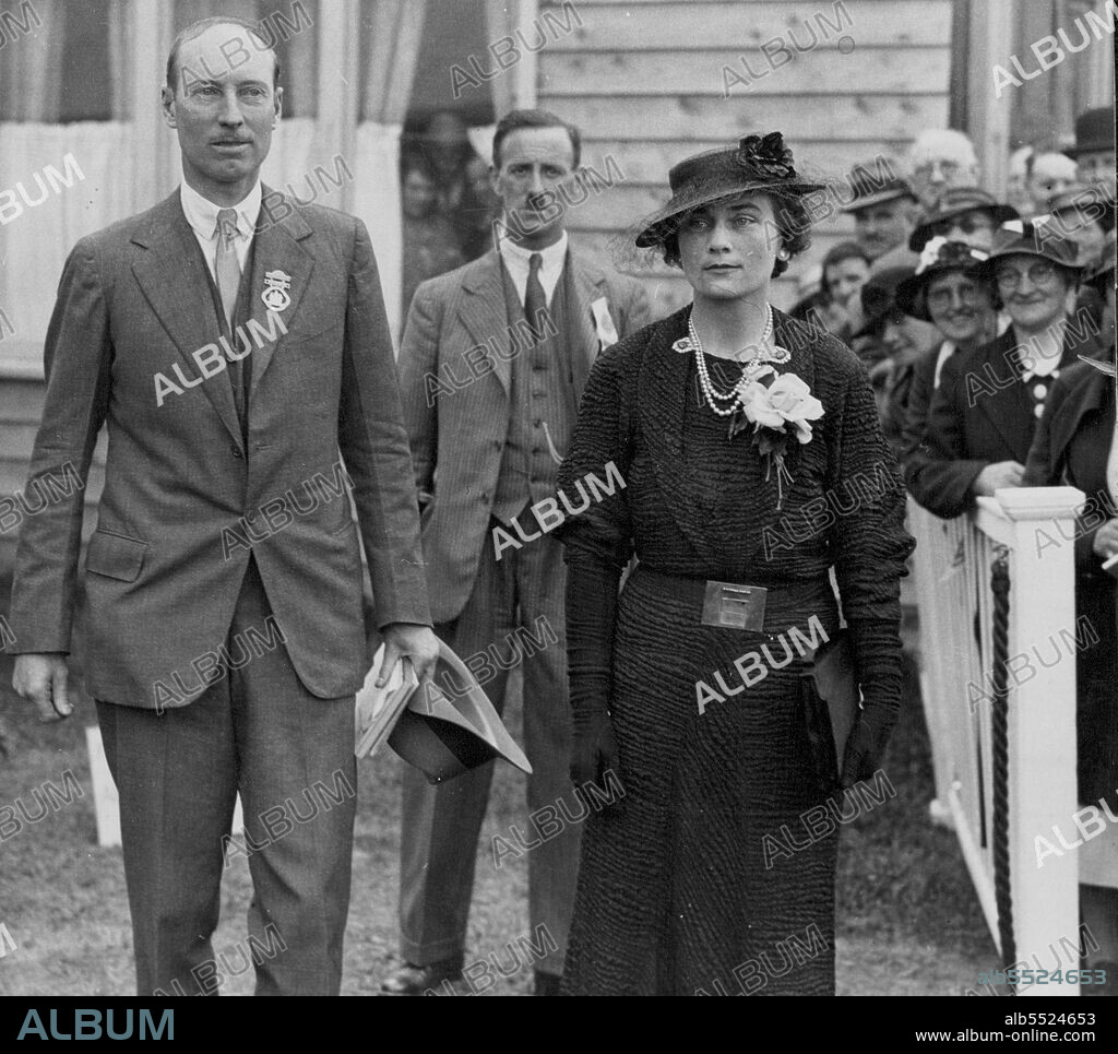 Duchess Of Gloucester Visits Highland Show: The Duchess accompanied from the Royal Box by her brother, the Duke of Buccleuch.The Duchess of Gloucester yesterday visited the Highland Show at Melrose, Roxburghshire, where she was received by her brother, the Duke of Buccleuch, President of the Society. June 25, 1936. (Photo by Topical Press).