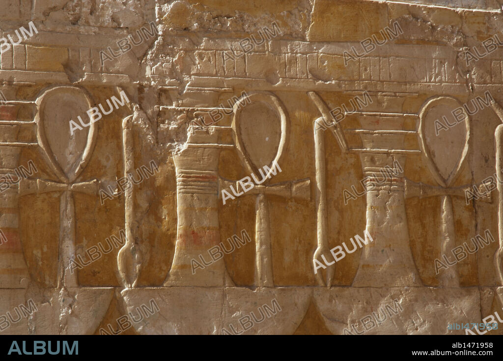 ARTE EGIPCIO. EGIPTO. Relieves con la representación de los amuletos o fetiches: ANKH "VIDA", también conocida por cruz ansada o lazo de vida. UAS O UADY, cetro o bastón, vinculdo al poder y bienestar. PILAR DYED, símbolo de permanencia. TEMPLO DE HATSHEPSUT. Templos de Deir-El-Bahari. XVIII Dinastía. Imperio Nuevo.