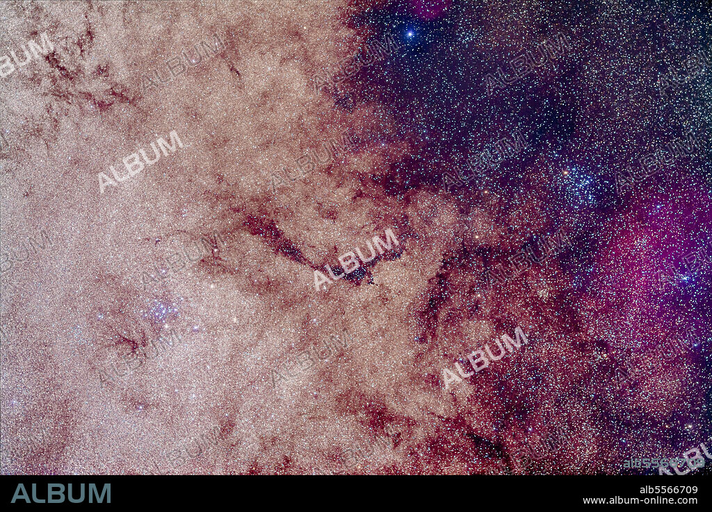 The two open clusters, Messier 7 (left), Ptolemy Cluster, and Messier 6 (right), the Butterfly Cluster. Messier 7 is embedded in the bright star clouds of the Milky Way while Messier 6 is in the dark lanes.