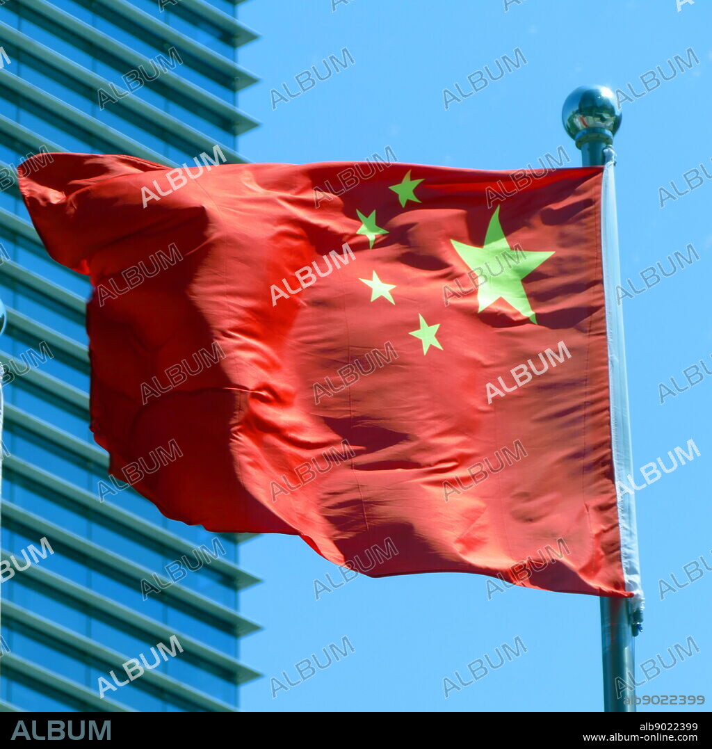 The flag of China, features one large star, with four smaller stars. The red represents the communist revolution; the five stars and their relationship represent the unity of the Chinese people under the leadership of the Communist Party of China (CPC). The first flag was hoisted by the People's Liberation Army (PLA) on a pole overlooking Beijing's Tiananmen Square on October 1, 1949, at a ceremony announcing the establishment of the People's Republic of China.