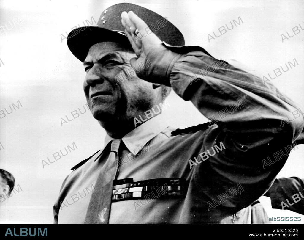 General Juin In Saigon.General Alphonse Juin, French Commander in North Africa, Saluting the guard of Honour Lined-up on Saigon's (French Indo-China) Airport Oct. 17, when he arrived with M. Letourneau, Minister for the Associated States, to make a through investigation and report of the position in Indo-China, where Rebel Forces recently fought and won a big battle with French troops. October 20, 1950. (Photo by Associated Press Photo).