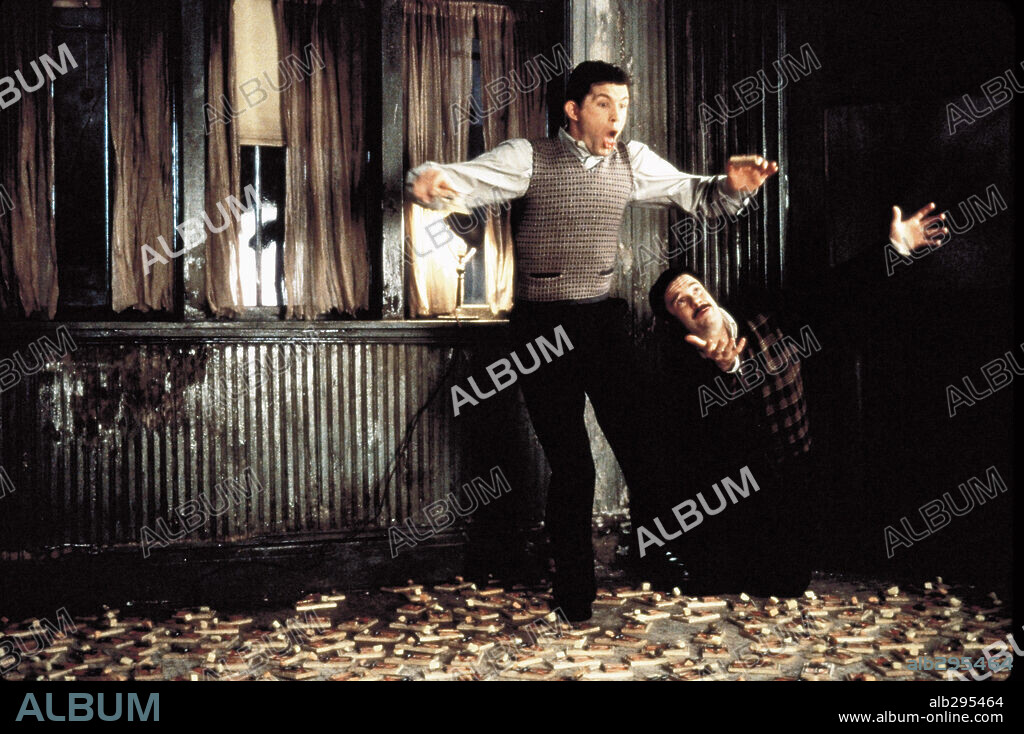 LEE EVANS and NATHAN LANE in MOUSEHUNT, 1997, directed by GORE VERBINSKI. Copyright TM & DREAMWORKS / SEBASTIAN, LOREY.