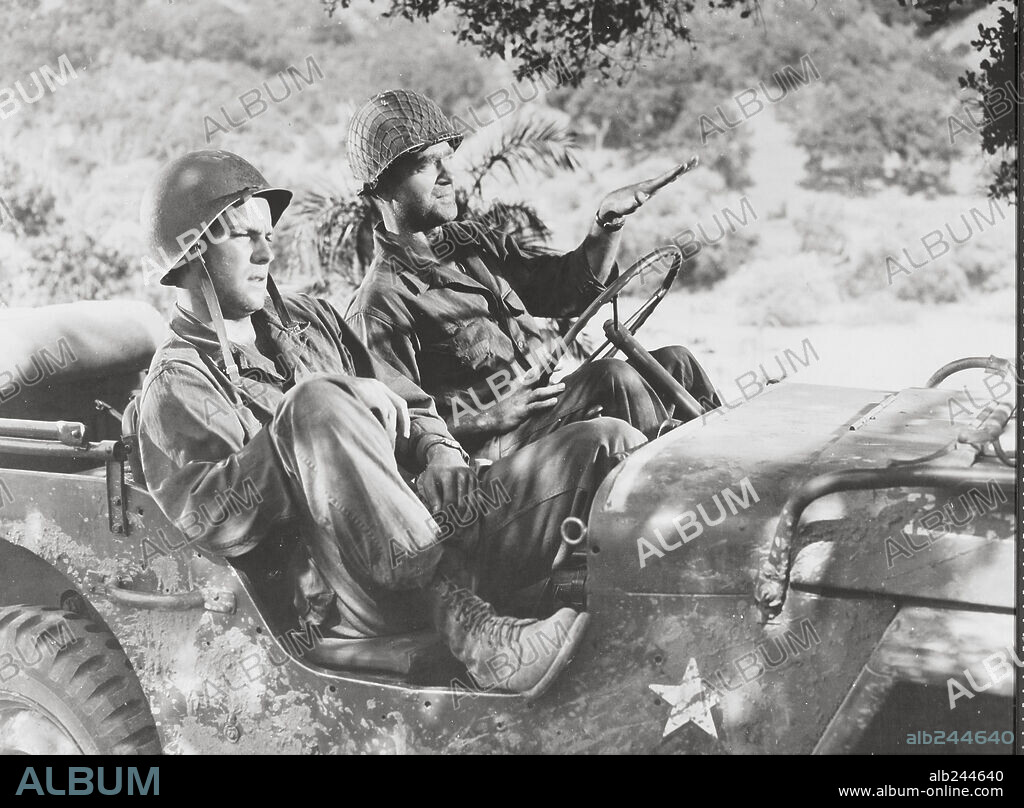 BUDDY EBSEN and ROBERT WAGNER in BETWEEN HEAVEN AND HELL, 1956, directed by RICHARD FLEISCHER. Copyright 20TH CENTURY FOX.