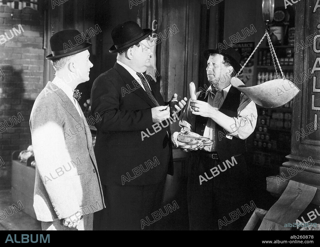 OLIVER HARDY and STAN LAUREL in THE DANCING MASTERS, 1943, directed by MALCOLM ST. CLAIR. Copyright 20TH CENTURY FOX.