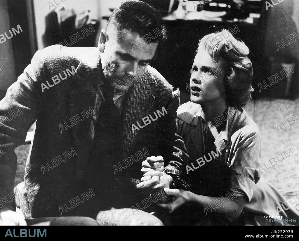ANNE FRANCIS and GLENN FORD in THE BLACKBOARD JUNGLE, 1955 (BLACKBOARD JUNGLE), directed by RICHARD BROOKS. Copyright M.G.M.