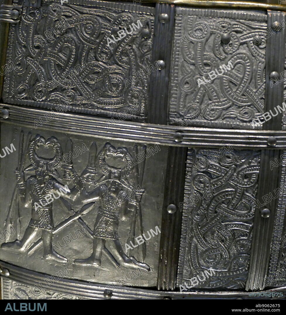 reconstruction of the Sutton Hoo helmet, a decorated Anglo-Saxon helmet discovered during the 1939 excavation of the Sutton Hoo ship-burial. Buried around 625 AD. it is believed to have been the helmet of King Raedwald; for whom its elaborate decoration may have given it a secondary function almost akin to a crown.