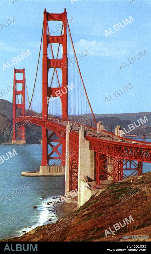 Golden Gate Bridge, San Francisco, California, USA, 1957. Vintage postcard showing the Golden Gate Bridge looking toward the Marin shore. The bridge spans the Golden Gate, the opening of San Francisco Bay into the Pacific Ocean. At the time of its completion in 1937, it was the longest suspension bridge in the world.