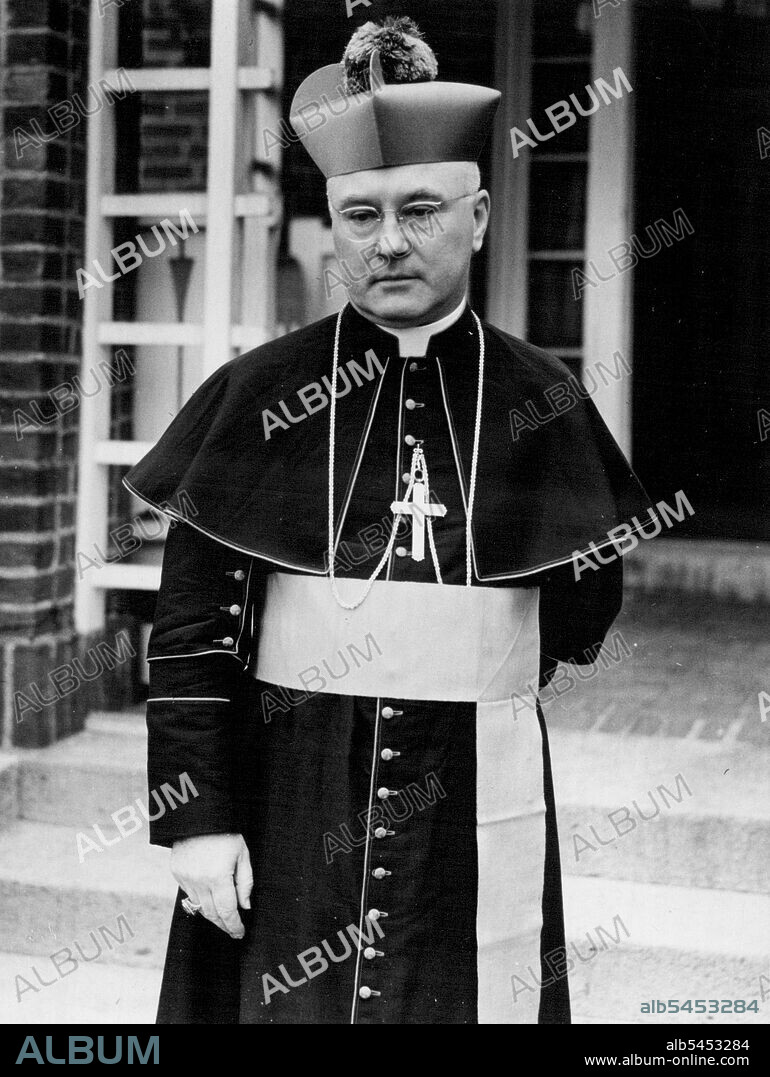 Spellman Named New York Archbishop -- Mongignor Francis J. Spellman; Auxiliary Bishop of Boston; who was named today Archbishop of New York by Pope Pius XII. He is shown as he posed today in front of his Sacret Heart Parish House were. He succeeds the late Patrick Cardinal Hayes. April 24, 1939. (Photo by Wide World Photos).