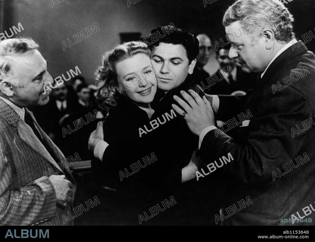 JOHN GARFIELD and PRISCILLA LANE in DUST BE MY DESTINY, 1939, directed by LEWIS SEILER. Copyright WARNER BROTHERS.