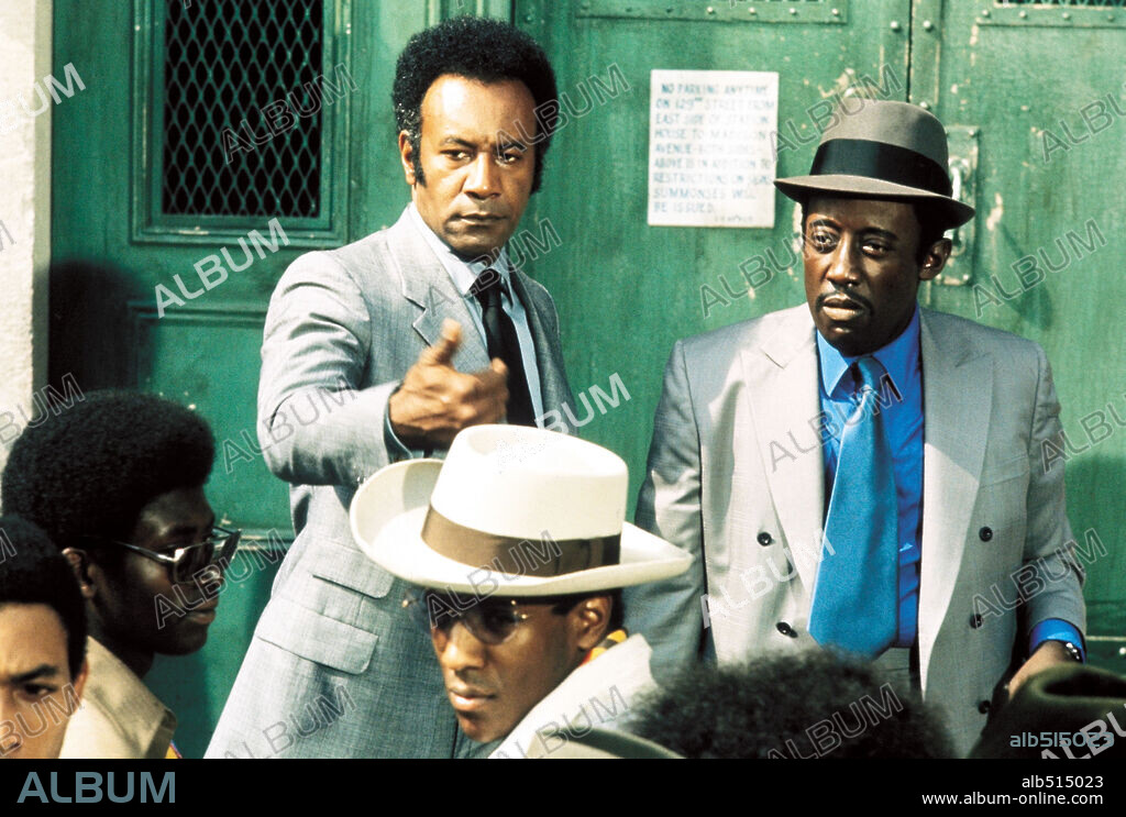 GODFREY CAMBRIDGE and RAYMOND ST. JACQUES in COTTON COMES TO HARLEM, 1970, directed by OSSIE DAVIS. Copyright UNITED ARTISTS.