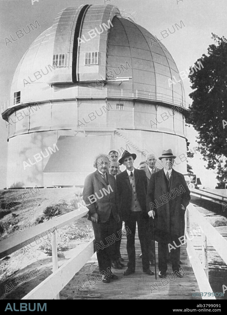 Albert Einstein with fellow scientists at Mount Wilson Observatory near Los Angeles, California, on January 31, 1931. From left to right in the front row are Einstein, Walter S. Adams, director of the Observatory, and William Wallace Campbell, Lick Observatory astronomer and former president of the University of California.