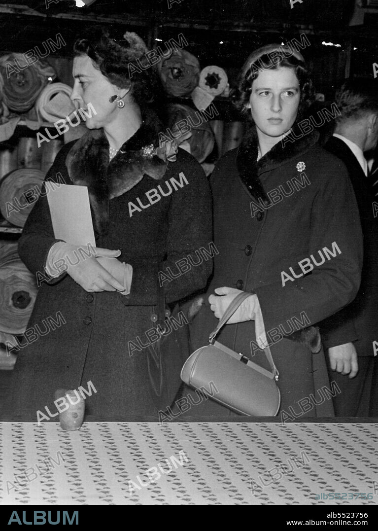First Official Tour for Princess Alexandra -- 16 year old Princess Alexandra of Kent went on her first official tour yesterday - a trip to Lancashire's cotton belt. Her Mother, the Duchess of Kent, went with her. At the Calico Printing Works at Accrington, the Duchess and her daughter stopped to admire some work in the Fine Screen Printing section. October 13, 1953. (Photo by Daily Express Picture).