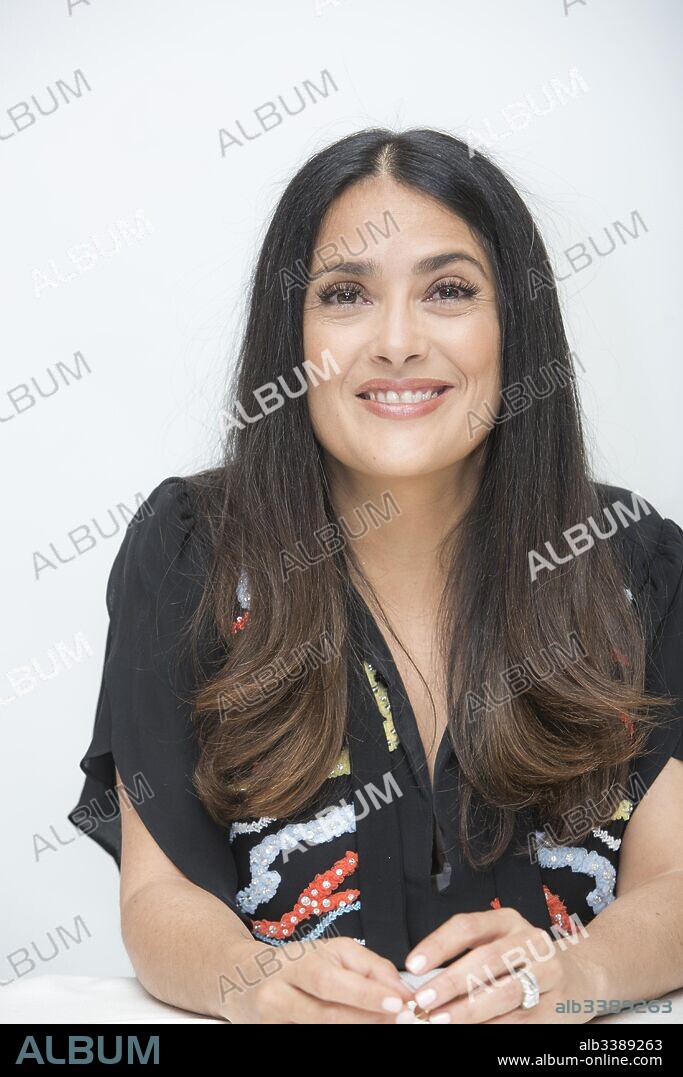SALMA HAYEK. June 14, 2017 - Hollywood, California, U.S. - SALMA HAYEK promotes 'Beatriz at Dinner.' Salma Hayek (born September 2, 1966) is a Mexican-American film actress, producer, and former model. She began her career in Mexico starring in the telenovela Teresa and starred in the film El Callejon de los Milagros (Miracle Alley) for which she was nominated for an Ariel Award. In 1991 Hayek moved to Hollywood and came to prominence with roles in movies such as Desperado (1995), From Dusk Till Dawn (1996), Dogma (1999), and Wild Wild West (1999). Her breakthrough role was in the 2002 film Frida as Mexican painter Frida Kahlo for which she was nominated in the category of Best Actress for an Academy Award, BAFTA Award, Screen Actors Guild Award, and Golden Globe Award. This movie received widespread attention and was a critical and commercial success. She won a Daytime Emmy Award for Outstanding Directing in a Children/Youth/Family Special in 2004 for The Maldonado Miracle and received an Emmy Award nomination for Outstanding Guest Actress in a Comedy Series in 2007 after guest-starring in the ABC television comedy-drama Ugly Betty. She also guest-starred on the NBC comedy series 30 Rock from 2009 to 2013. Hayek's recent films include Grown Ups (2010), Puss in Boots (2011), Grown Ups 2 (2013), and Tale of Tales (2015).The Hitman's Bodyguard (2017), How to Be a Latin Lover (2017), Drunk Parents (2017), Beatriz at Dinner (2017. 14/06/2017