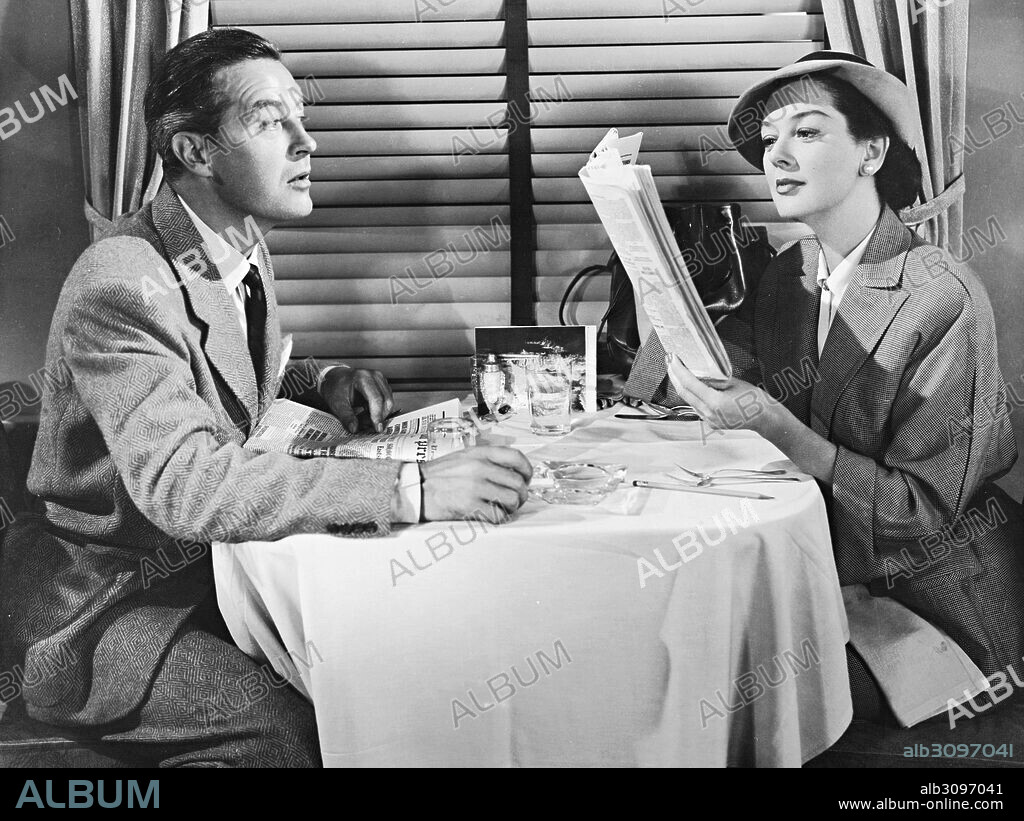 RAY MILLAND and ROSALIND RUSSELL in A WOMAN OF DISTINCTION, 1950, directed by EDWARD BUZZELL. Copyright COLUMBIA PICTURES.