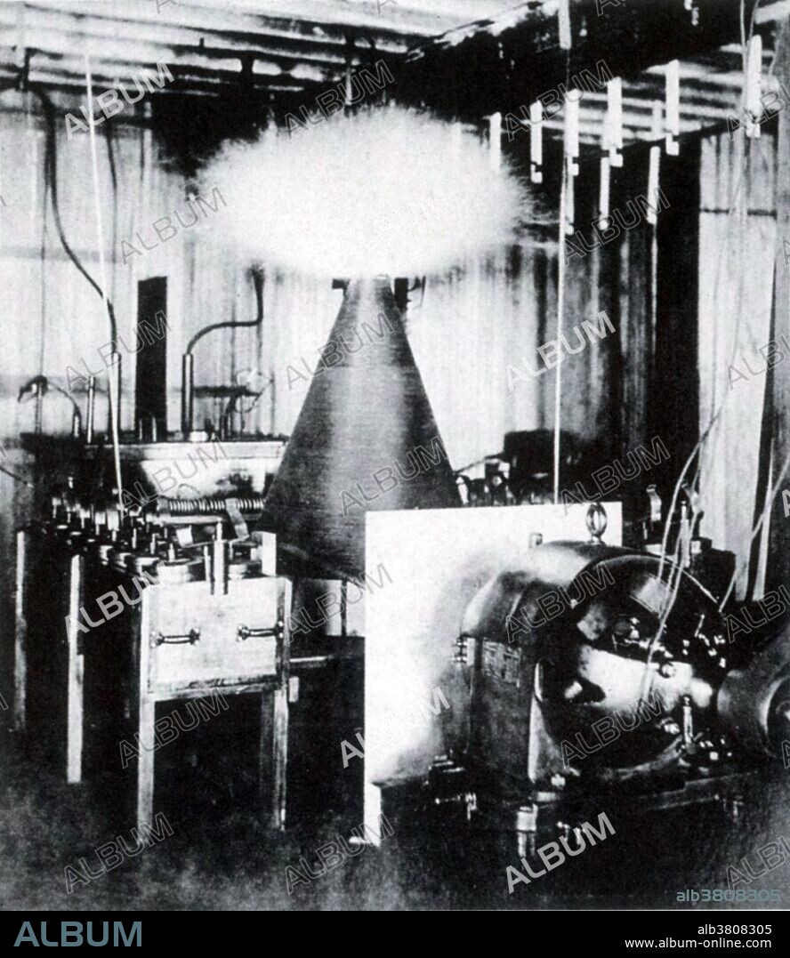 Tesla conical coil discharging electricity. The streamers at the top of the coil are of purple hue and several feet in diameter. Nikola Tesla (July 10, 1856 - January 7, 1943) was a Serbian-American inventor, electrical engineer, and futurist. He was an important contributor to the use of commercial electricity, and for developing the modern alternating current (AC) electrical supply system. Because of his 1894 demonstration of short range wireless communication through radio and as the eventual victor in the "War of Currents" (Tesla vs. Edison), he was widely respected as one of the greatest electrical engineers. He was known for his great showmanship, presenting his innovations and demonstrations to the public like a magician. Tesla was a life long bachelor who may have suffered from obsessive-compulsive disorder. He did things in threes, and was adamant about staying in a hotel room with a number divisible by three. He died in 1943, at age 86, in room 3327 of the New Yorker Hotel. Later that year the US Supreme Court credited him as being the inventor of the radio. No photographer credited, Tesla Laboratory at 35 South 5th Avenue, NYC, 1895.