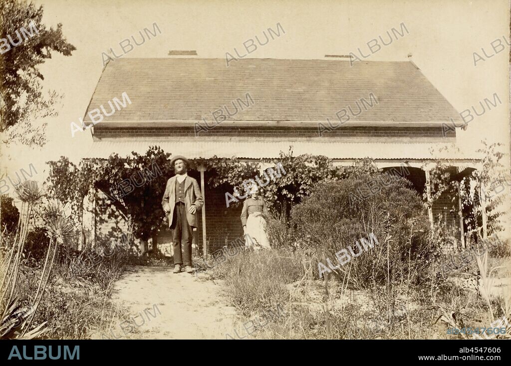 Digital Photograph - Charles & Ellen Partington Outside 'Willis Vale' Homestead, Greensborough, Victoria, circa 1885, Charles Partington (senior) and his wife Ellen (nee Whatmough), standing in front of the old 'Willis Vale' homestead, at Greensborough. The house was built in 1839 of hand-made bricks, all made and fired on the property.