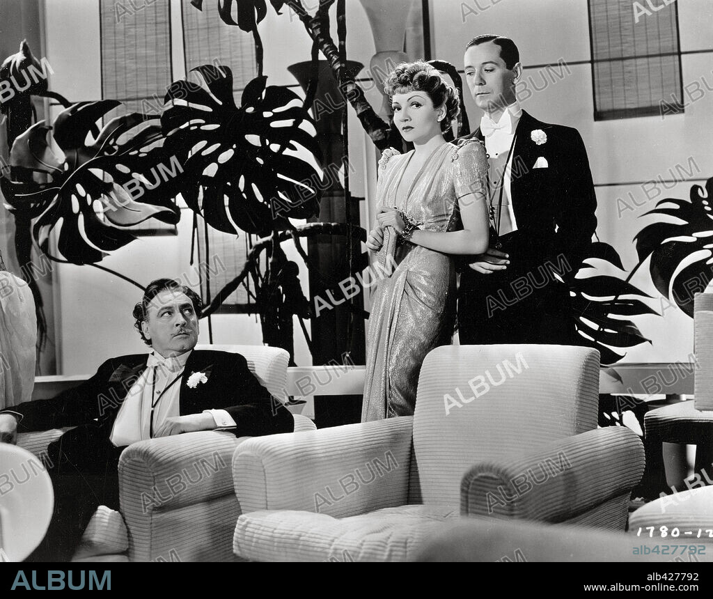 CLAUDETTE COLBERT y JOHN BARRYMORE en MEDIANOCHE, 1939 (MIDNIGHT), dirigida por MITCHELL LEISEN. Copyright PARAMOUNT PICTURES.