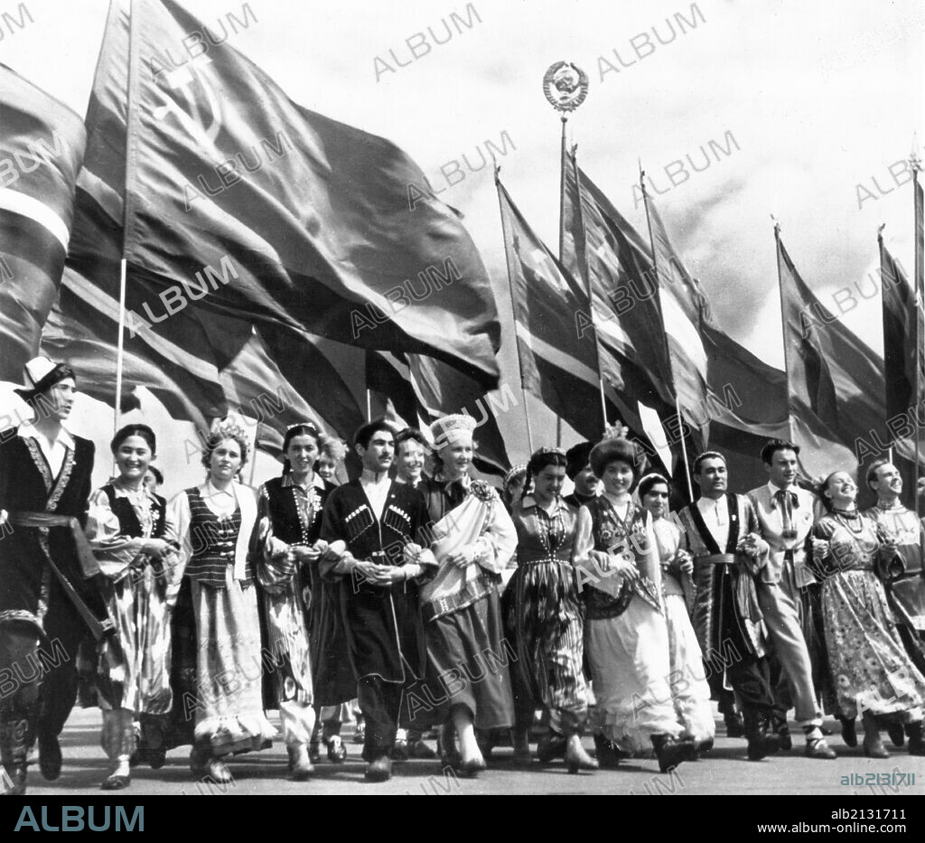 Sixth world festival of youth and students in moscow, july 28, 1957, delegates of the soviet union, representing all 15 republics, marching in lenin stadium during the opening ceremonies.