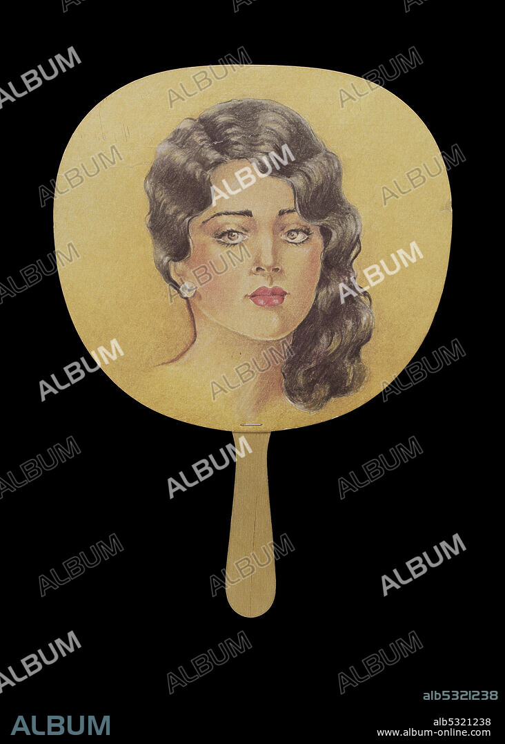 The Cotton Club in New York City initially refused entry to black patrons, even though the venue featured many of the most popular black entertainers of the era, including Duke Ellington, Louis Armstrong, Count Basie, Fats Waller, Cab Calloway and Bessie Smith. On the front is a color illustration of a woman's portrait. The woman looks at the viewer and her hair is swept up around her neck to fall over her shoulder. Only the top of shoulders, her neck and head are seen. On her ear is a round earring. The illustration is on a yellow background. On the reverse of the fan is a black and white silhouette of a jungle with a band playing music. The jungle scene takes up the majority of the back with the band only along the bottom portion. At the top of the back, in white letter is the club name "The/ COTTON CLUB." The wood handle is attached to the back in the middle. On either side of the handle is black text; on the left "Lenox Avenue/ at 142nd St./ Br 2-7767-1687" and on the right "The Aristocrat/ of Harlem.".