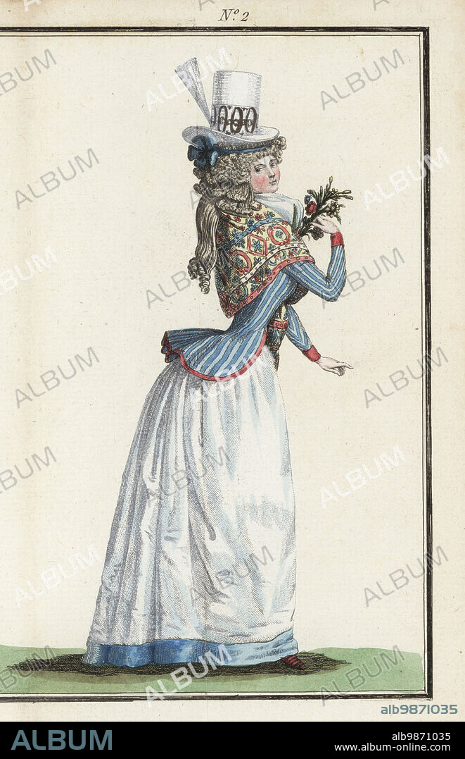 Fashionable woman in felt hat with white aigrette, embroidered kerchief or manteau, striped-blue caraco jacket, white fichu and satin skirt. Handcoloured copperplate engraving from Jean-Antoine le Brun or Lebrun-Tossas Journal de la Mode et du Gout, previously Cabinet des Modes, Chez Buisson, Paris, and Joseph le Boffe, London, Premier Cahier, February 1790.
