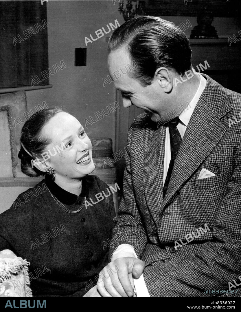 Michael Parker's Hello And Goodbye.
Lieutenant Commander Michael Parker, secretary to the Duke of Edinburgh, chats with his Australian actress sister Mary Parker during a brief reunion in London November 22. She arrived in London two days earlier. Last night, November 23, Commander Parker left with the Queen and Duke on their Commonwealth tour.
Mary hopes to act on the British stage and screen. November 24, 1953.