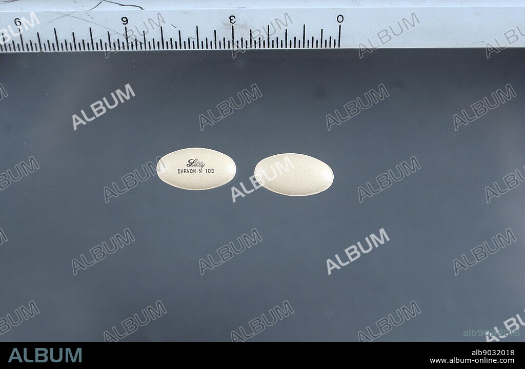 100 mg Dextropropoxyphene (Darvon) tablets; an analgesic in the opioid category, patented in 1955[4] and manufactured by Eli Lilly and Company. It is an optical isomer of levopropoxyphene. It is intended to treat mild pain and also has antitussive (cough suppressant) and local anaesthetic effects. The drug has been taken off the market in Europe and the US due to concerns of fatal overdoses and heart arrhythmias.