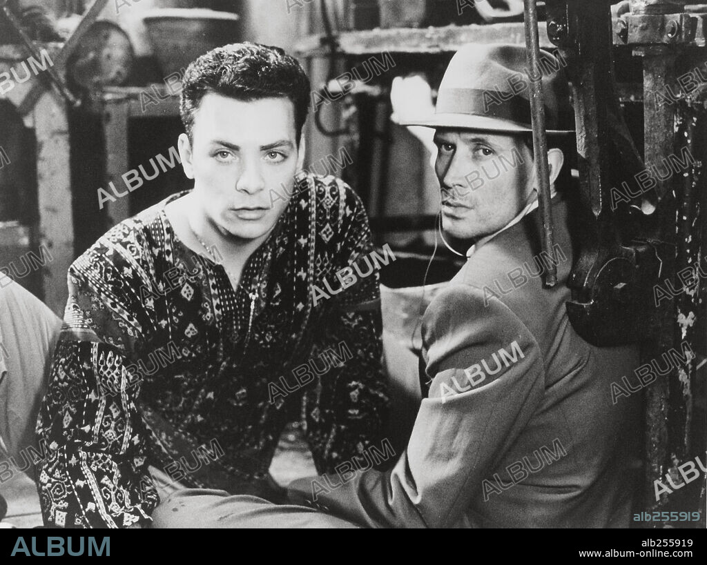 JOSEPH SCOREN y PETER WELLER en EL ALMUERZO DESNUDO, 1991 (NAKED LUNCH), dirigida por DAVID CRONENBERG. Copyright FILM TRUSTEES LTD./NAKED LUNCH PRODUCTIONS/NIPPON FILM DEVEL.