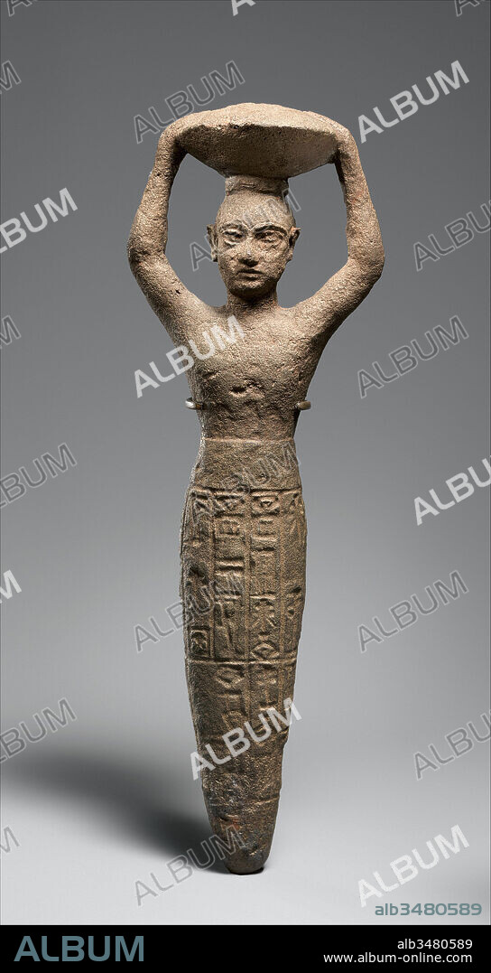 Foundation figure of Ur-Namma holding a basket, Ur III, ca. 2112–2095 B.C., Mesopotamia, Neo-Sumerian, Copper alloy, H. 27.3 cm (10 3/4 in.), Metalwork-Sculpture-Inscribed, This solid-cast figurine shows a male figure, beardless and with a shaved head, carrying a basket filled with earth above his head. The basket may indicate that the figure is participating in ceremonial building activities, such as the ceremony for making the first brick which is recorded in texts from this period.