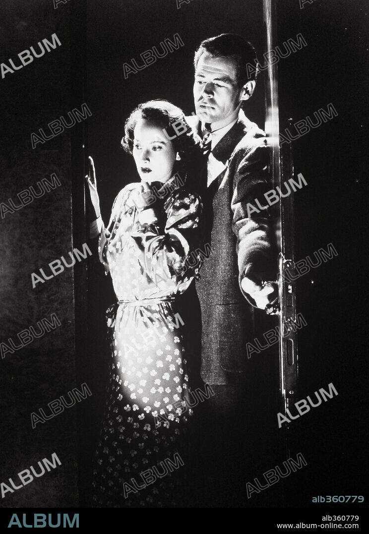 MERLE OBERON and ROBERT RYAN in BERLIN EXPRESS, 1948, directed by JACQUES TOURNEUR. Copyright RKO.