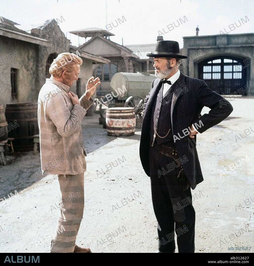 HENRY FONDA and KIRK DOUGLAS in THERE WAS A CROOKED MAN, 1970, directed by JOSEPH L. MANKIEWICZ. Copyright WARNER BROS/SEVEN ARTS.