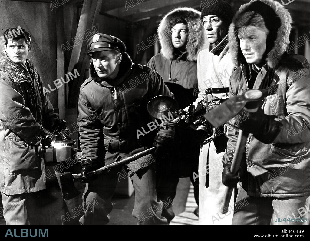 DEWEY MARTIN, DOUGLAS SPENCER and KENNETH TOBEY in THE THING FROM ANOTHER WORLD, 1951, directed by HOWARD HAWKS. Copyright RKO.