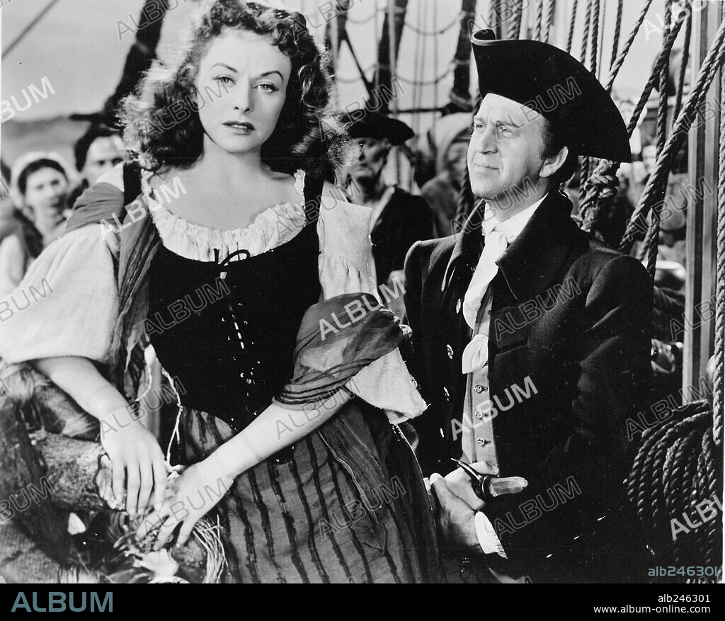 HOWARD DA SILVA and PAULETTE GODDARD in UNCONQUERED, 1947, directed by CECIL B DEMILLE. Copyright PARAMOUNT PICTURES.