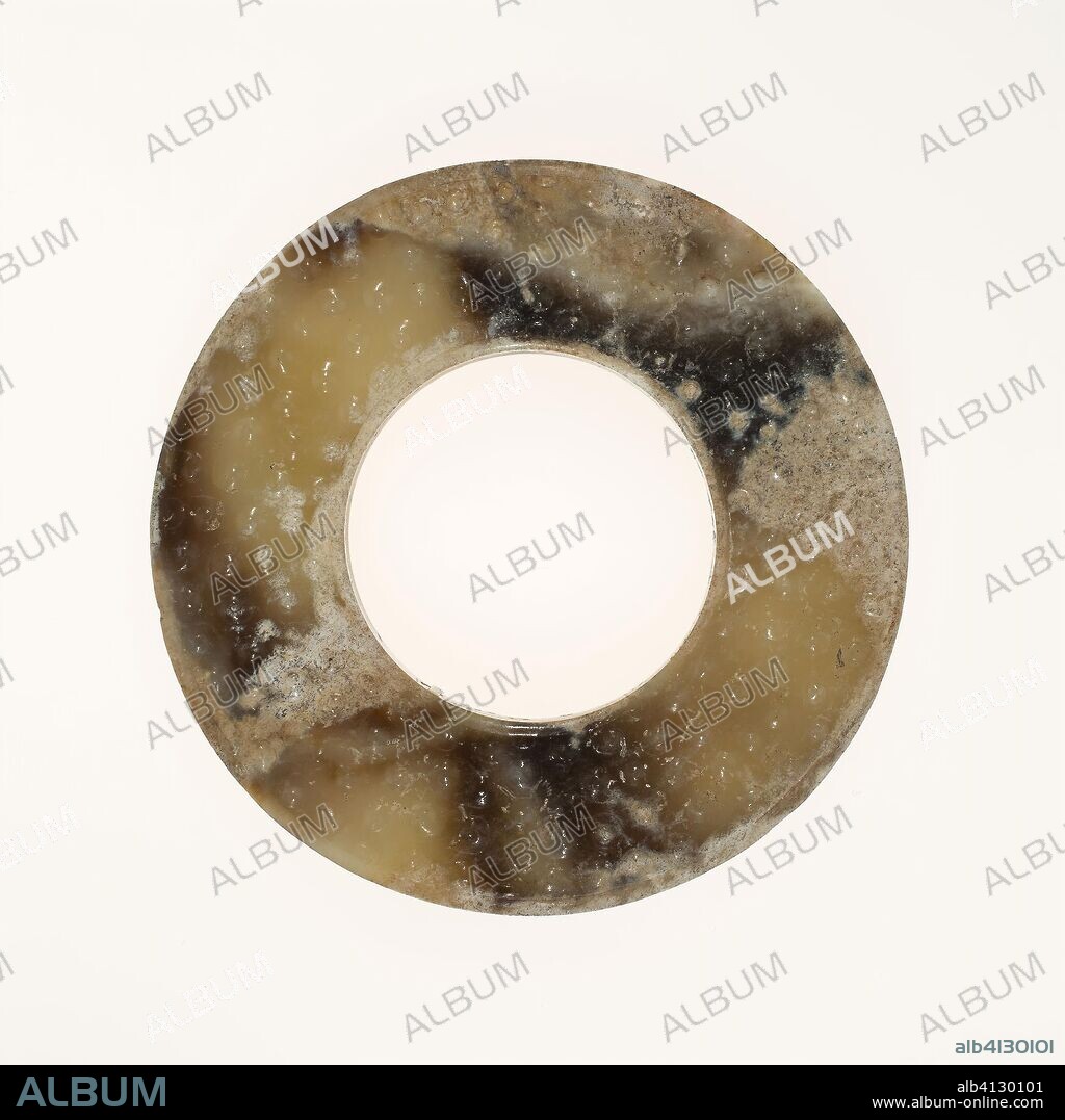 Ring. China. Date: 400 BC-200 BC. Dimensions: Diam. 3 1/2 in.; 7/8 in. flesh; 1/4 in. average thickness. Jade. Origin: China.