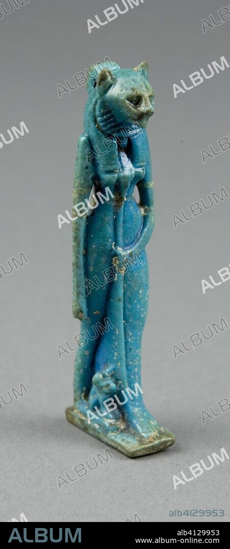 ANCIENT EGYPTIAN. Amulet of the Goddess Bastet (?). Egyptian. Date: 1070 BC-656 BC. Dimensions: 7.6 × 1.9 × 2.5 cm (3 × 3/4 × 1 in.). Faience. Origin: Egypt.