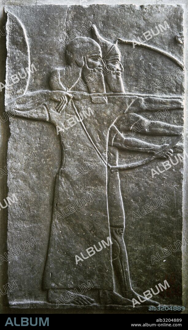 Assyrian. Palace of Sargon II of Dur-Sharrukin (actual Khorsabad). Relief of warriors. 8th century BC. Louvre Museum. Paris. France.