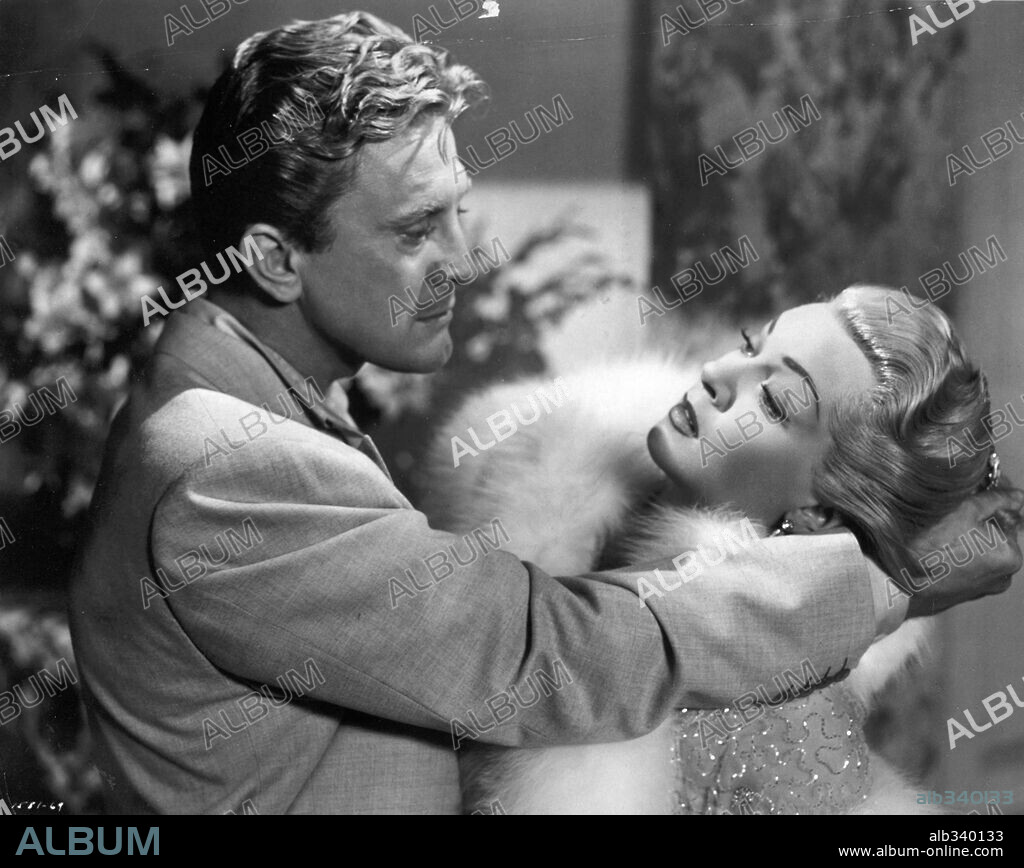 KIRK DOUGLAS y LANA TURNER en CAUTIVOS DEL MAL, 1952 (THE BAD AND THE BEAUTIFUL), dirigida por VINCENTE MINNELLI. Copyright M.G.M.
