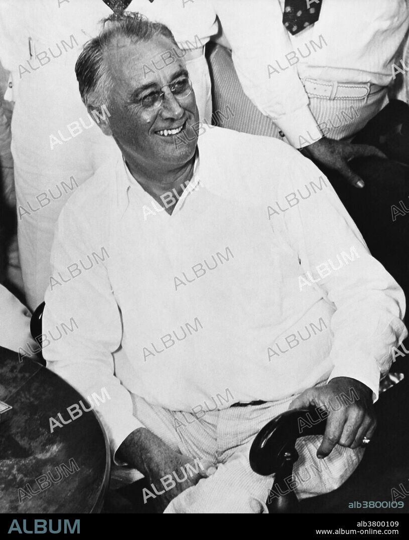 FDR at Jefferson Island, June 26th, 1937. Franklin Delano Roosevelt (January 30, 1882 - April 12, 1945) was the 32nd President of the US (1933-45) and a central figure in world events during the mid-20th century, leading the US during a time of worldwide economic crisis and world war. The only American president elected to more than two terms, he facilitated a durable coalition that realigned American politics for decades. With the popular song "Happy Days Are Here Again" as his campaign theme, FDR defeated incumbent Republican Hoover in 1932, at the depth of the Great Depression. FDR's persistent optimism and activism contributed to a renewal of the national spirit, reflecting his victory over paralytic illness to become the longest serving president in US history. As an active military leader, he implemented a war strategy on two fronts that ended in the defeat of the Axis Powers, and he initiated the development of the world's first atomic bomb. He worked closely with Churchill, Stalin and Kai-shek in leading the Allies against Nazi Germany, Fascist Italy and Imperial Japan in WWII, but died just as victory was in sight. On April 12, 1945 he suffered a massive cerebral hemorrhage and died at the age of 63. His death was met with shock and grief across America and around the world.