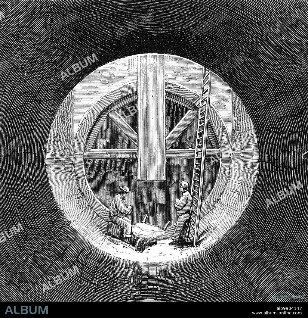 London Main Drainage: bottom of a shaft in the southern high-level sewer at Peckham, 1861. 'The southern high-level sewer consists of two lines, one commencing at Clapham and ending at New Cross, the other extending from Dulwich to the latter place, from which point they are carried in the same trench, but at different levels, under the Brighton, North Kent, and North Woolwich Railways, and along the New Cross road to the Broadway at Deptford; from this point they pass down Church-street to Deptford Creek, and, as the trench in which they are to be constructed will be the entire width of this street, the whole of the houses on either side will have to be underpinned - that is, they must have entirely new foundations put to them...At Deptford Creek these two sewers discharge their storm-waters through two culverts eleven feet in diameter; but the ordinary sewage will be conveyed by four iron pipes under the Creek by gravitation into the outfall sewer. The southern highlevel sewer drains an area of about twenty square miles, embracing Clapham, Dulwich, Camberwell, and Peckham'. From "Illustrated London News", 1861.