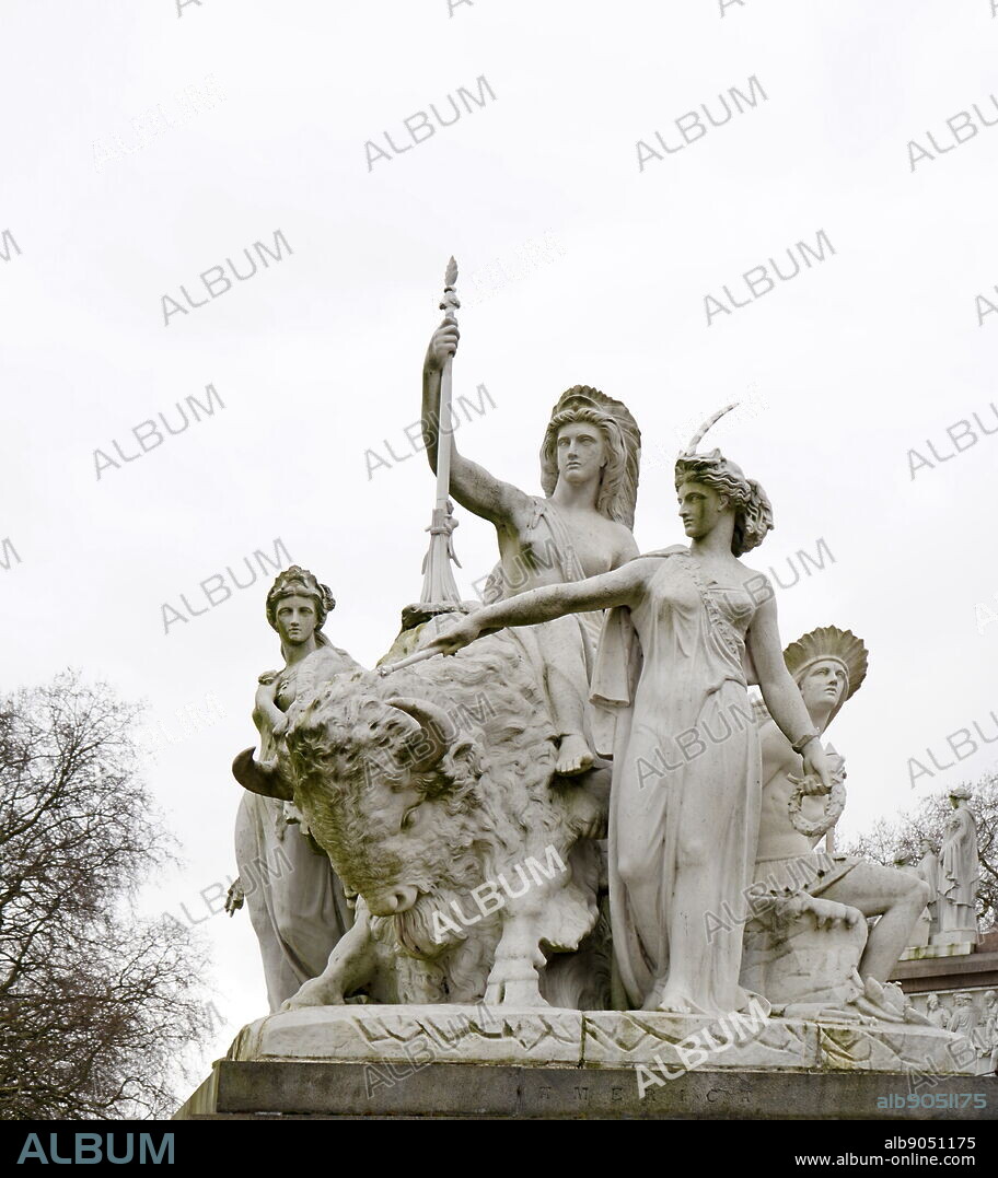 The Albert Memorial in Kensington Gardens, London. Commissioned by Queen Victoria in memory of her beloved husband, Prince Albert who died of typhoid in 1861. The memorial was designed by Sir George Gilbert Scott in the Gothic Revival style. Opened in July 1872 by Queen Victoria.