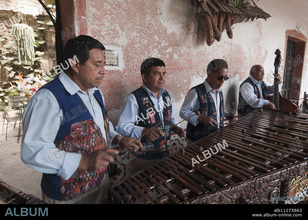 Men playing Marimba at Hotel Posada Don Rodrigo, Antigua, Guatemala, Central America.