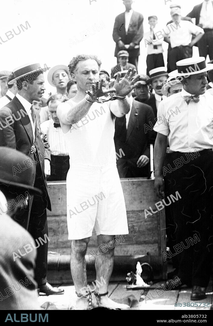 Harry Houdini (March 24, 1874 - October 31, 1926) was a Hungarian-American illusionist and stunt performer, noted for his sensational escape acts. He began his magic career in 1891. He focused initially on traditional card tricks and billed himself as the "King of Cards". He soon began experimenting with escape acts. He first attracted notice as "Harry Handcuff Houdini" on a tour of Europe, where he challenged police forces to keep him locked up. Soon he extended his repertoire to include chains, ropes slung from skyscrapers, straitjackets under water, and having to hold his breath inside a sealed milk can. He concealed the exact details of his escapes to maintain an air of mystery and suspense. As President of the Society of American Magicians, he was keen to uphold professional standards and expose fraudulent artists. He was also quick to sue anyone who pirated his escape stunts. Houdini died of peritonitis, secondary to a ruptured appendix at the age of 52.