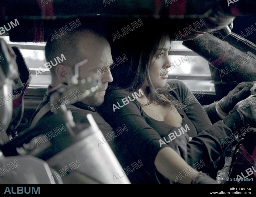 JASON STATHAM and NATALIE MARTINEZ in DEATH RACE, 2008, directed by PAUL W. S. ANDERSON. Copyright IMPACT PICTURES.
