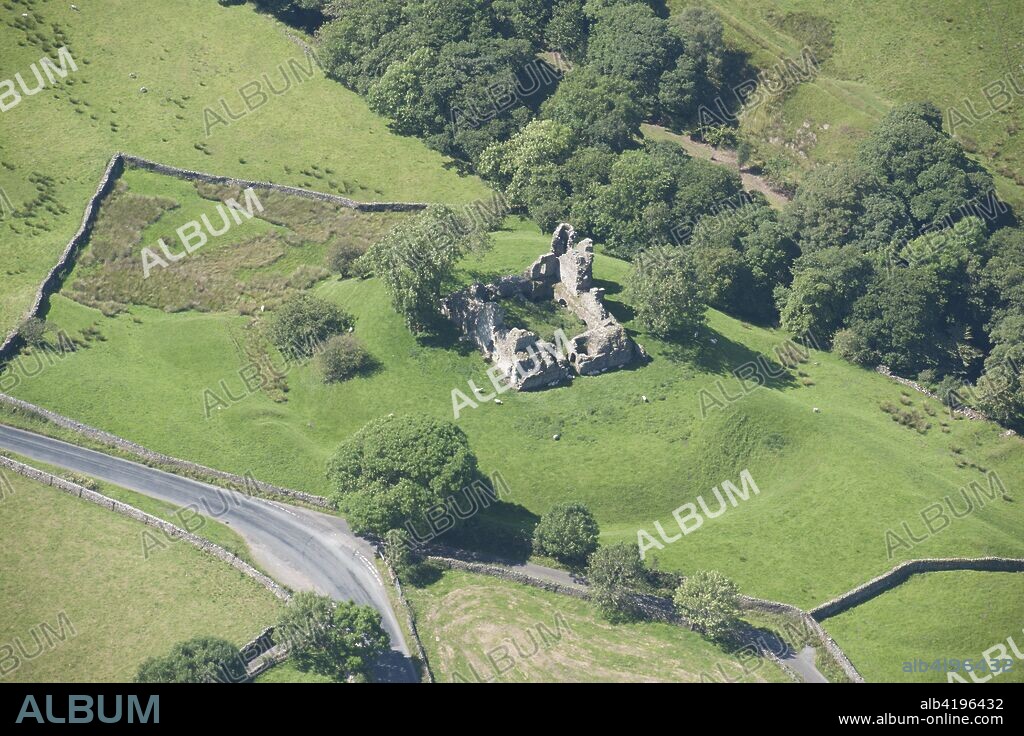 Pendragon Castle, Cumbria, 2014. Aerial view of the remains of a fortified tower house and its earthwork defences situated on a knoll overlooking the River Eden. The castle dates from the 12th century but, according to legend, was built by Uther Pendragon, father of King Arthur.