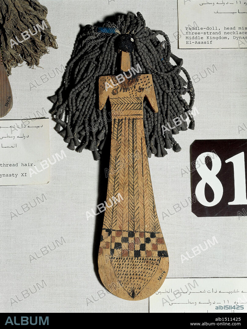Egyptian civilization, Middle Kingdom, Dynasty XI. Painted wooden doll from Thebes.