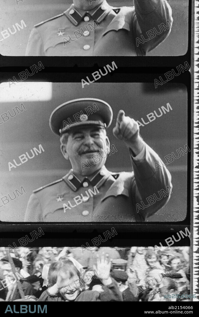 JUSSIF WISSARIONOWITSCH DSCHUGASCHWILI. News reel of joseph stalin watching a may day parade in red square, moscow, 1949. 01/02/1949
