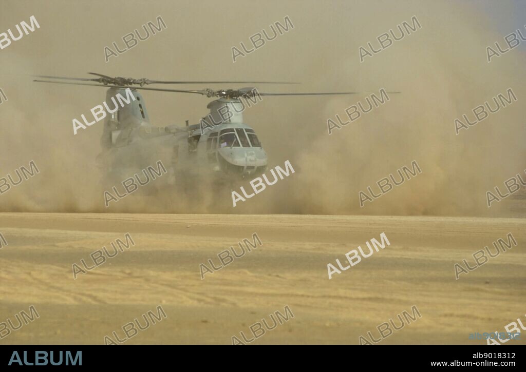 Camp Rhino, Afghanistan (Dec. 2, 2001) -- A United States Marine Corps. CH-46 Sea Knight helicopter lands on the desert landing strip code named Rhino. Rhino is a forward-base of operations strategically located inside Afghanistan. U.S. Navy Photo.