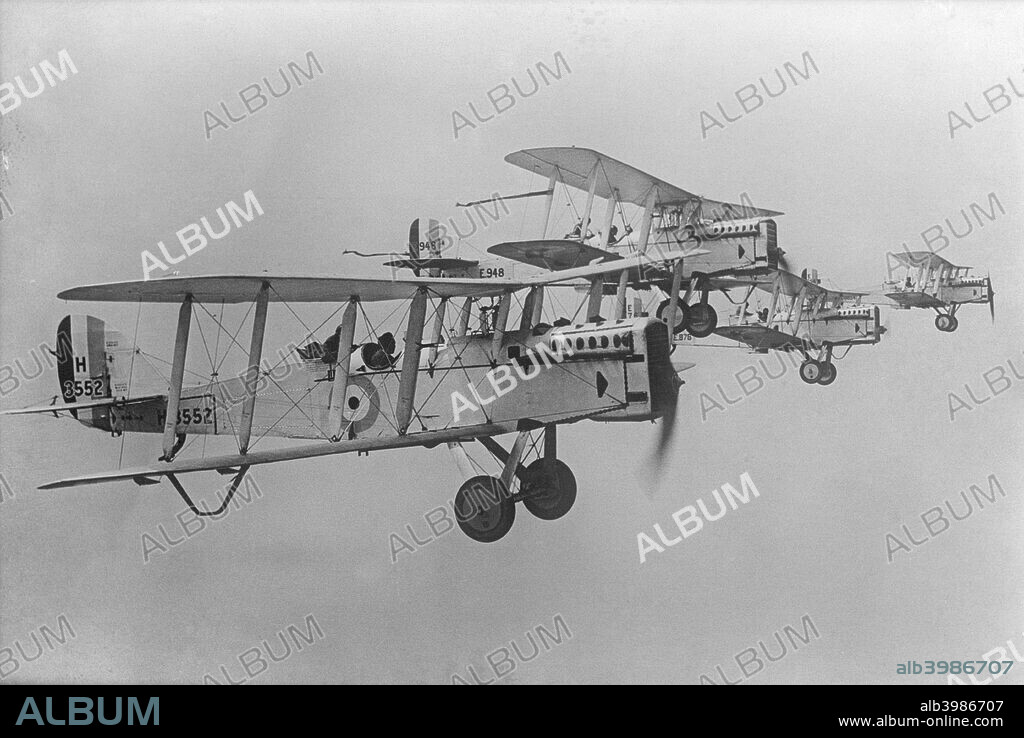 De Havilland DH9 aeroplanes flying in formation, 1923. From a copy negative made in 1923. Designed in 1916 by Airco, it first saw action with the Royal Flying Corps over the Western Front in 1917, but the aircraft went out of service with the RAF in 1920. Large numbers were subsequently exported for use by Commonwealth Air Forces or were adapted for use by civilian air transport companies. Some adaptations remained in use until 1936.