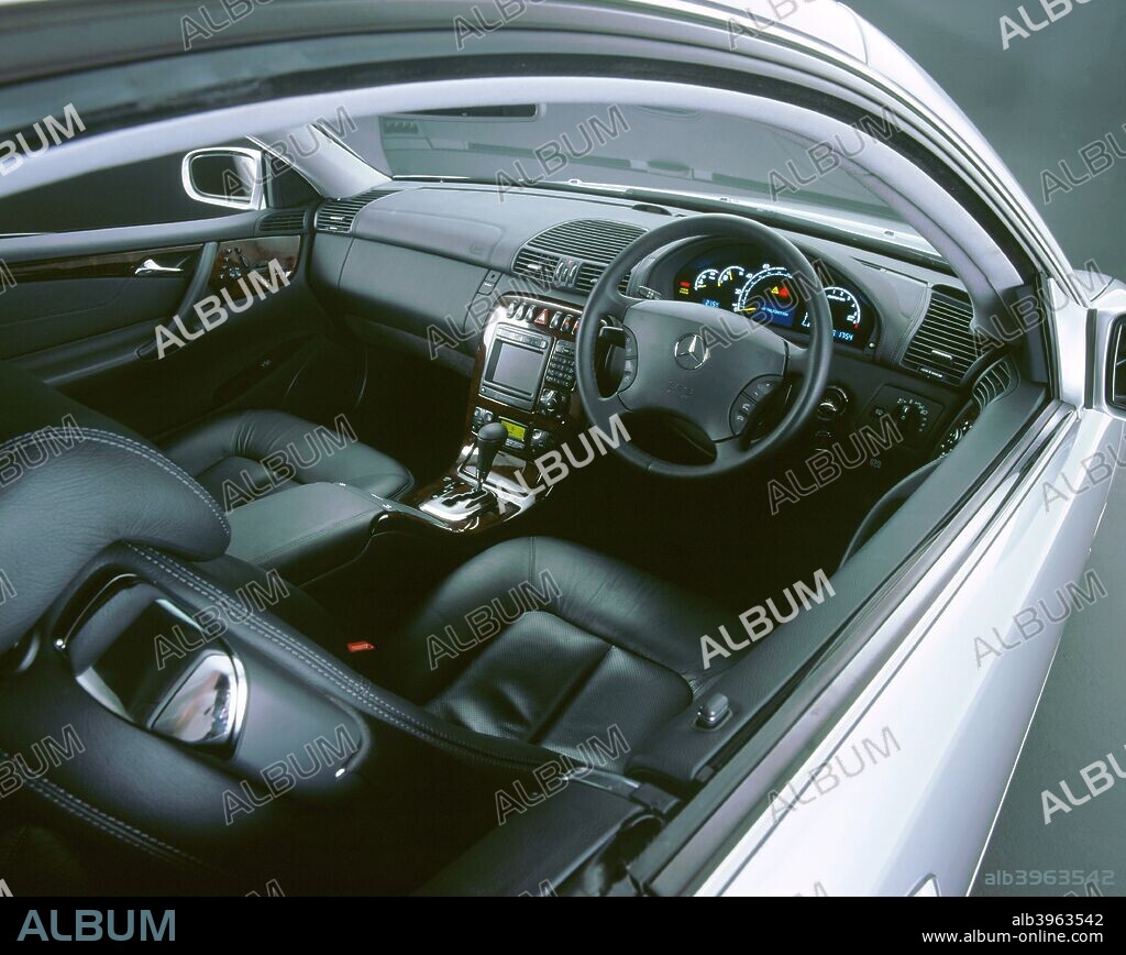 2001 Mercedes Benz CL 55 AMG V8 interior detail in a black studio.