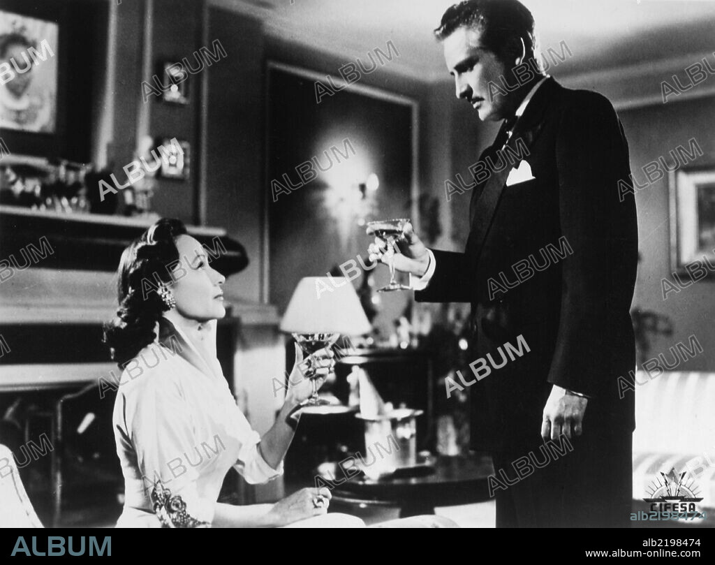 ARTURO DE CORDOVA and MARIA FELIX in REPORTAJE, 1953, directed by EMILIO FERNANDEZ. Copyright CLASA-MOHME INC.